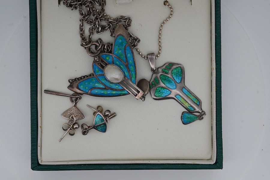 An Edwardian Art Nouveau silver and enamel drop pendant, by Charles Horner, Chester, 1908, 46mm, on a later 925 chain, together with one other Art Nouveau white metal, enamelled and mother of pearl set pendant necklace a